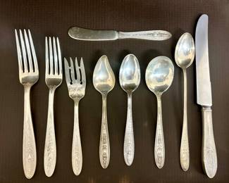 Wedgewood by international. Service for 12 plus a few serving pieces. Also in a nice silverware chest. No discount