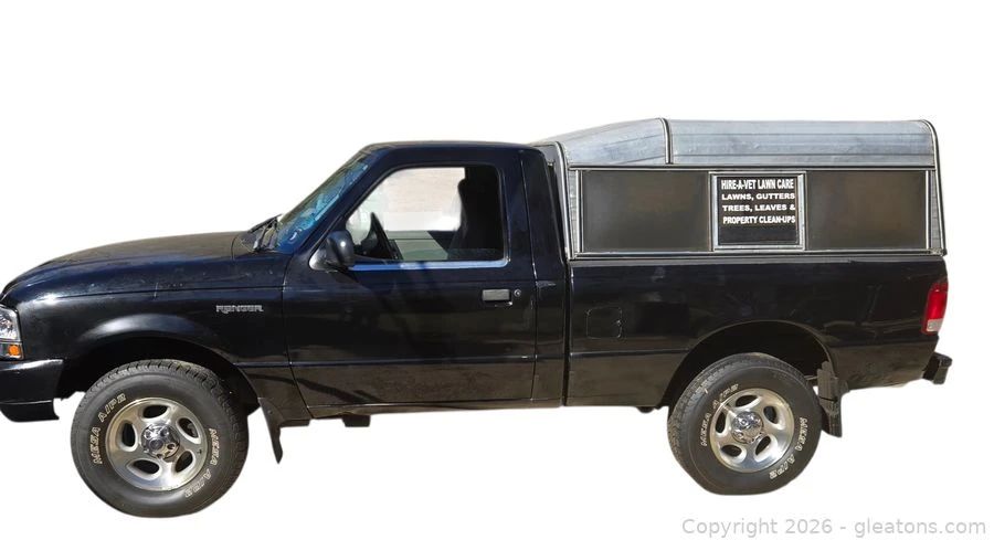 2000 Black Ford Ranger with Camper Shell