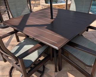 Lanai table, chairs and umbrella