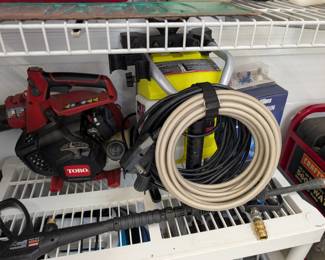 Pressure washer and a blower