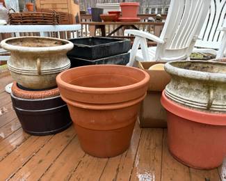 Assorted Garden Planters Including Terracotta, Composite Urn, and Barrel Planter