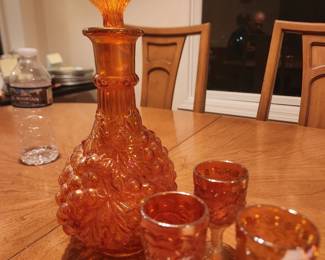 Vintage Carnival Glass decanter and 3 cordial glasses; $15
