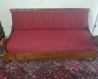 Coming in hot with this incredible hand carved Teak Balinese sofa / day bed, custom made to our clients' parents' specifications! Crafted by Indonesian artisans in the early 90s, check out the hand carved details! The custom base cushions are covered in moisture resistant indoor / outdoor (undercover) Sunbrella fabric. 72x40x32, seat at 17. $2,400.