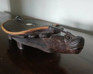 According to their records, this turtle stool was purchased by my client's parent in April 1996, in the Mahakam River region of Balikpapan – the heart of the Borneo jungle. It was hand carved from Ironwood (with shell inlay) by a local Dayaknese artist. At the time, they paid the equivalent of $250 (in the local currency), which is $515 in today's money. $400.
