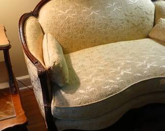 This absolutely stunning diminutive settee represents the best of both worlds, a century old masterpiece completely restored top to bottom! The craftsmanship of the original Rosewood carvings combined with luxurious textured high-end fabric, all of which is in pristine condition! 48x30, back 35 high, seat at 19. $1,200.