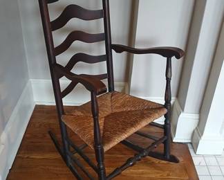 Exquisite mid-19th Century ladder back, cane bottom rocker, in pristine condition. This client's family had proven Mayflower decent. Completely hand turned and hand crafted, from virgin New England timber.