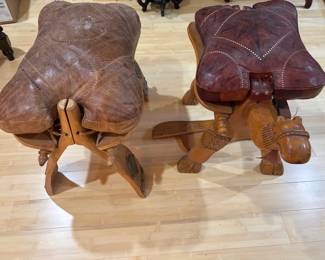 Camel Saddle Stools One for Use and One for Restoration