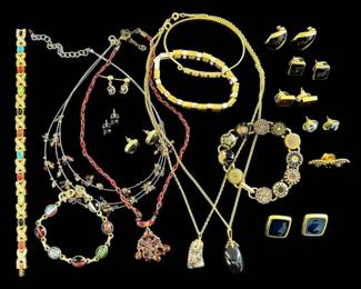 Black GoldToned Bracelets, Necklaces, And Earrings