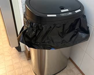 . . . stainless steel waste basket