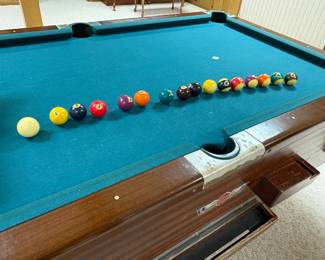 . . . with size-adjusted rack of balls