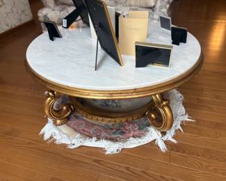. . . round marble coffee table