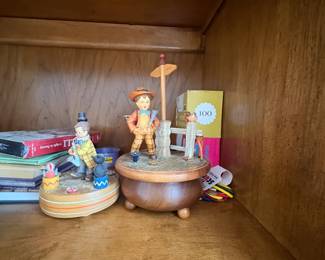 . . . Hummel-like wood music boxes