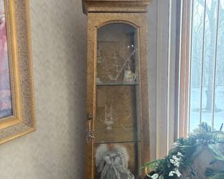 . . . wonderful petite curio cabinet