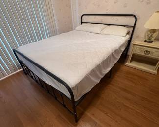 . . . wrought-iron bed