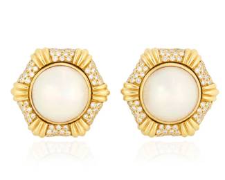 107 GemLok: A Pair of 18K Gold, Mabe Pearl and Diamond Earclips Centering two round mabe Pearls, set in a hexagonal frame set with round diamonds weighing approximately 1.44 carats total, signed GemLok 2 pieces  Measures: 1 x 1 in. 31.1 grams gross Estimate: $400 - $600