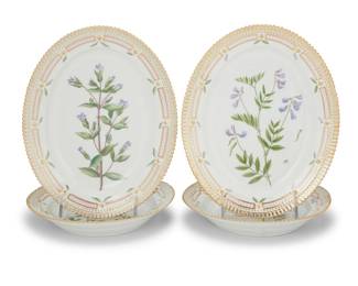 413 Four Royal Copenhagen porcelain 'Flora Danica' oval platters Date codes for 1961-74 Each with green printed factory mark above underglaze blue wave and green painted pattern 20 over shape number 3516, black painted titles in Latin 4 pieces Each: 9.75" W x 7.75" D Estimate: $1,500 - $2,000