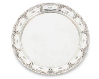 285 A group of sterling silver table items 20th century Each marked: STERLING; and for various makers such as Towle, Reed & Barton, Poole, and Fisher Including three circular dishes and a small rectangular tray, a creamer, and a trembleuse cup and saucer with porcelain liner, one dish with commemorative inscription Total weight: 35.7 oz. troy approximately 6 pieces Estimate: $1,200 - $1,800