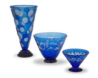 395 Steven Correia (b. 1949) Three Contemporary acid cut blue overlay glass vases, 1989-1990 Each with etched signature and date: Correia / L. E.; tallest numbered 9/200 and inscribed: EVL8142; medium bowl numbered 16/20 Artist Proof; smallest numbered 12/500 and inscribed: ESG8129 3 pieces Tallest: 13" H x 7" Dia.; Medium: 6.5" H x 8" Dia.; Shortest: 4.125" H x 5.75" Dia. Estimate: $700 - $900