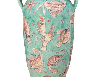 311 A Solimene Vietri glazed earthenware floor vase Mid-20th century Stamped to underside: Solimene / ® / [bird cipher] / Vietri sul mare Italy; signed indistinctly With opposed lug handles, decorated with fish, coral, and other sea creatures 26.75" H x 16.25" W x 14" D Estimate: $250 - $350