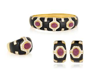 71 An 18K Gold, Onyx, Ruby and Diamond Suite Including a bangle, pair of earrings and ring all of a geometric design featuring onyx elements, oval ruby cabochons and accented by round and baguette diamonds weighing approximately 7.90 carats total 4 pieces  Bangle: 6 1/2 in., Earrings: 1 x 1/2 in., Ring: 8 1/2 107.7 grams gross Estimate: $5,000 - $7,000