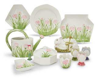 248 An assembled Este ceramic part dinner service 20th century Each with factory marks and numbered; vase numbered: 6420; bud vase marked: peint main; rabbit stamped: amm / Italy Comprising: 11 dinner plates (13") 2 large serving platters (14.75" W x 11.625" D) 3 hexagonal serving bowls (11.25" W x 10.5" D) 6 small trapezoidal bowls (6.25" W x 7.375" D) 2 watering cans (10.75" H x 14.875" W x 6" D) 2 octagonal tureens (5.5" H x 9" W x 8.25" D) 2 handkerchief vases (4.25" H x 4.625" Dia.) 9 cabbage-form cups (4.75" H x 3.125" Dia.) Together with: 1 Herend double-wall vase (4.875" H x 5.375" Dia.) 1 Limoges tulip bud vase (5.875" H x 1.875" Dia.) 1 English jug in the form of an ear of corn with pewter lid (10.625" H) 1 rabbit-form covered tureen with spoon (6" H x 9.75" W x 4.5" D) 41 pieces Estimate: $400 - $600