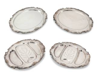 276 A Stieff sterling silver footed center bowl Early/mid-20th century Impressed: STIEFF / STERLING / A / S [within a lozenge] / 086 The bell-form bowl decorated with chased lappet band below the rim, above garlands joining cartouches, monogrammed 6.62" H x 11.12" Dia. 31.5 oz. troy approximately Estimate: $1,000 - $1,500