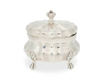 206 A Buccellati sterling silver covered box Mid-20th century Impressed: ITALY / BUCCELLATI / STERLING The hinged domed lid over the bombé body raised on animal paw feet 3.5" H x 3.5" W x 2.75" D 5.5 oz. troy approximately Estimate: $300 - $500