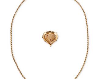 91 A 14K Gold and Ruby Heart Locket Necklace Including a long gold rope chain together with a heart-shaped double-sided locket accented by six round rubies 2 pieces  Chain: 24 in., Pendant: 1 1/2 x 1 1/2 in. 30.8 grams gross Estimate: $1,000 - $2,000