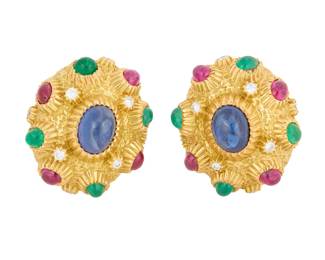 58 Van Cleef & Arpels: A Pair of 18K Gold, Gem-Set and Diamond Earclips Of an organic design featuring oval emerald, ruby and sapphire cabochons accented by round diamonds, signed Van Cleef and Arpels, made in France 2 pieces  Measures: 7/8 x 3/4 in. 18.6 grams gross Estimate: $5,000 - $7,000