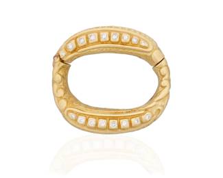 99 An 18K Gold and Diamond Scarf Slide Of a rounded square design featuring textured gold, set with sixteen round diamonds weighing approximately 0.65 carat  Measures: 1 5/8 x 1 1/2 in. 29.2 grams gross Estimate: $2,000 - $3,000