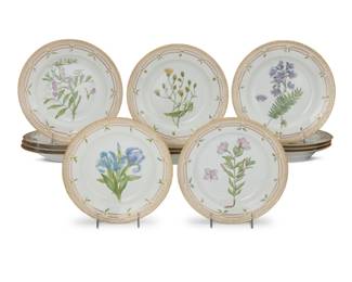 409 A set of fourteen Royal Copenhagen porcelain 'Flora Danica' dinner plates Date codes for 1950-84 Each with green printed factory mark above underglaze blue wave and green painted pattern 20 over shape number 3549, black painted titles in Latin 14 pieces Each: 10" Dia. Estimate: $4,000 - $6,000