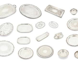 209 A large group of sterling silver and silver plated serving articles 20th century Two trays marked for sterling and Poole, numbered: 370 [or] 371; footed bowl marked: Sterling / Columbia / Weighted; most of the rest variously marked for maker and numbered Comprising two sterling silver shaped rectangular trays in graduated sizes, a weighted sterling bowl, and various silver-plated trays and servers, some from International Silver Co. or partnered makers, including two in the 'Joanne' and 'Staffordshire' patterns, together with a nickel silver breadbasket 19 pieces Largest tray: 21" W x 14.625" D; Weighted sterling bowl: 3.375" H x 9.5" Dia. Total weighable sterling: 36.5 oz. troy approximately Estimate: $300 - $400