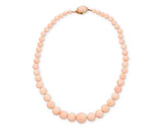 20 An 18K Gold and Coral Necklace Of a single strand design featuring graduated round coral beads measuring approximately 6.78 - 16.84 mm, finished with an 18k gold and coral clasp  Length: 20 1/2 in. 80.8 grams gross Estimate: $1,500 - $2,000