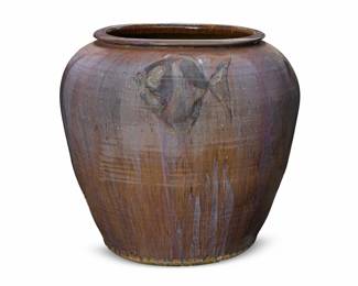 330 A monumental Contemporary ceramic jardinière 1975 Signed and dated to underside: Arbuckle / 75; inscribed illegibly Decorated with fish motifs over a flambé glaze 33" H x 36.5" Dia. Estimate: $300 - $500