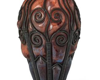 320 A Daum & Majorelle Art Nouveau glass and wrought iron vase Early 20th century Etched: Daum [cross of Lorraine] / L. Majorelle [Louis Majorelle (1859-1926)] The mottled glass blown out through iron swirls 14.5" H x 8.625" Dia. Estimate: $600 - $800