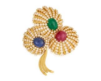 59 Van Cleef & Arpels: An 18K Gold, Gem-Set and Diamond Brooch, 1971 Of a flowing floral design centering an oval emerald, ruby and sapphire cabochon accented by bursts of graduated round diamonds weighing approximately 10.35 carats, signed Van Cleef and Arpels, NY42138, 1971  Measures: 2 1/2 x 2 in. 37.8 grams Estimate: $12,000 - $18,000