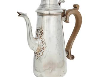 197 An Elizabeth II sterling silver coffee pot Sidney Beddall, Sheffield, 1968 With impressed standard, city, date letter, and maker's marks The hinged lid with turned finial, with scroll wood handle 11" H x 8.5" W x 4" D 29 gross oz. troy approximately Estimate: $800 - $1,200