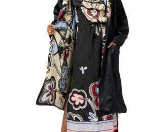 126 Michaele Vollbracht: A Printed Silk Maxi Dress & Coat Circa 1980s Each with label: Michaele Vollbracht Comprising a sleeveless pullover black and multicolored patterned silk shift dress with drawstring waist, wide double ruffle collar, in-seam pockets, and curved hem with side splits, together with a black silk satin opera-style hooded oversized swing coat with raglan sleeves, and with a matching silk print lining and two large patch pockets 2 pieces  Dress: bust across front: 21.5 in.; waist: 19.5 in.; hips: 21.5 in.; armholes: 16 in. Dia.; length: 60 in.; Coat: CB length: 45 in.; sleeves: 29 in. (from neckline) Estimate: $200 - $400