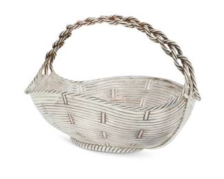 213 A Fratelli Cacchione for Cartier sterling silver basket Mid-20th century Marked: Cartier / FC / 925 / ITALY / STERLING The pseudo wicker oval basket with braided handle 7.75" H x 11.125" W 38.3 oz. troy approximately Estimate: $1,200 - $1,800