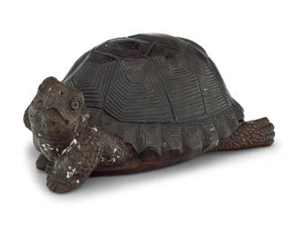 304 A patinated bronze figure of a turtle Circa 1970s Signed: A. Tiot 5.25" H x 12.75" W x 9.75" D Estimate: $200 - $400