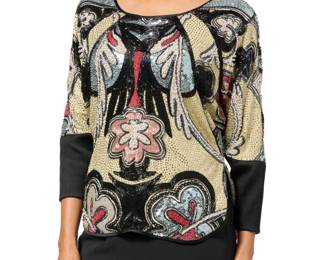 125 Michaele Vollbracht: A Vintage Beaded Evening Top Circa 1980s Label: Michaele Vollbracht A round neck pullover top with rounded hem and dolman sleeves, featuring allover floral and wing designs in multicolored faux pearl, bugle beads, and sequins, with quilted black silk cuffs with black buttons, black silk lining, and small shoulder pads  No size label: waist across front: 18.5 in.; sleeves: 23 in. (from neckline); length: 25 1/2 in. (shoulder to hem) Estimate: $200 - $300