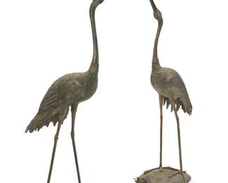 241 Two life size patinated bronze models of cranes 20th century Comprising one Japanese Meiji style crane depicted atop the back of a turtle with a beast head, with fountain hardware, and another figure on a rectangular base 2 pieces Turtle: 69" H x 26" W x 18" D; Taller: 72" H x 32" W x 22" D, approximately Estimate: $1,000 - $1,500