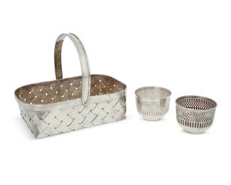 282 A Gorham sterling silver oval serving bowl Mid-20th century With impressed factory and: STERLING / 977 / 3 [in a cartouche] With a scalloped rim and lobed body 2.125" H x 13.375" W x 10.125" D 23.3 oz. troy approximately Estimate: $600 - $800