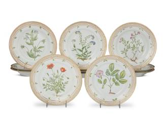406 A set of twelve Royal Copenhagen porcelain 'Flora Danica' dinner plates Date codes for 1948-84 Each with green printed factory mark above underglaze blue wave and green painted pattern 20 over shape number 3549; black painted titles in Latin 12 pieces Each: 10" Dia. Estimate: $3,000 - $5,000