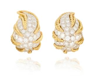 52 A Pair of 18K Bi-Color Gold and Diamond Earclips Of a flame design featuring accents of rope gold and round diamonds weighing approximately 2.28 carats 2 pieces  Measures: 7/8 x 1/2 in. 15.4 grams gross Estimate: $800 - $1,200