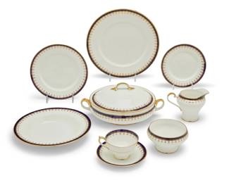 329 An Aynsley porcelain part dinner service 20th century Each with green printed factory mark Comprising: 12 dinner plates (10.5") 12 soup bowls (9.375") 11 salad plates (8.25") 11 bread & butter plates (6.375") 12 cups (3.75") with 12 saucers (5.625") 1 covered vegetable dish (5" H x 11.125" W x 8.875" D) 1 cream jug (4.125" H x 5.375" W x 3.75" D) 1 open sugar (2.75" H x 4.875" Dia.) 73 pieces Estimate: $400 - $600