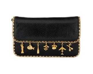 154 Judith Leiber: A Black Karung Leather Clutch Bag with 'World Travel' Charms Marked to interior plaque: Judith Leiber / © A vintage black snake leather envelope purse with gold-toned hardware including gold chain edging and multiple gold travel motif charms suspended from the front flap, with a drop-in chain strap and black grosgrain lining, multiple interior pockets, as well as a gold compact mirror, and a gold comb with tassel  4 1/2 in. H x 7 1/2 in. W x 2 1/4 in. D; strap drop: 19 in. Estimate: $200 - $400