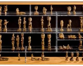 298 Reg Butler (1913-1981) "Musée Imaginaire," conceived 1961-62, cast 1963 39 patinated bronze figures in custom wood and mirror-backed display case Edition: 1/9 Each bronze impressed with monogram and numbered: © RB [overlapping] Cast by Valsuani Foundry, Paris Case: 30.5" H x 48.5" W x 5" D Estimate: $30,000 - $50,000