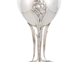 185 A Towle sterling silver chalice Mid-20th century Impressed factory marks and: STERLING / 1 3/4 PINTS / 6982 / J With three daffodils, their stems forming supports 9.375" H x 5.125" Dia. 17.6 oz. troy approximately Estimate: $600 - $800
