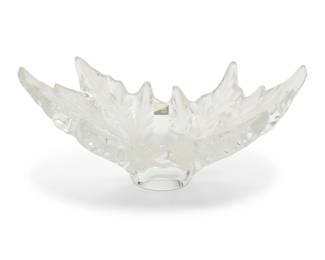 392 A Lalique glass 'Champs Elysees' centerpiece bowl Late 20th/early 21st century Etched: Lalique ® / France; with partial factory label 7.75" H x 18" W x 10.125" D Estimate: $700 - $900